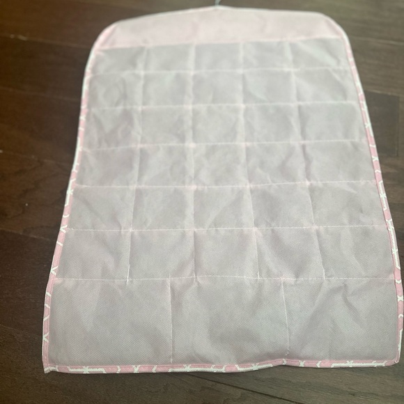 Jewelry hanging storage bag with 33 individual pockets of storage - Picture 2 of 2